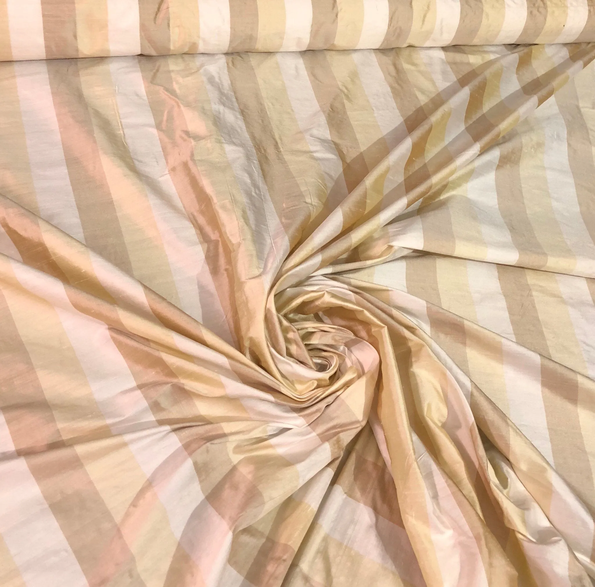100% silk shantung stripe, 54&quot; wide. Beautiful ivory brownish yellow gold. Fabric sold by the yard.