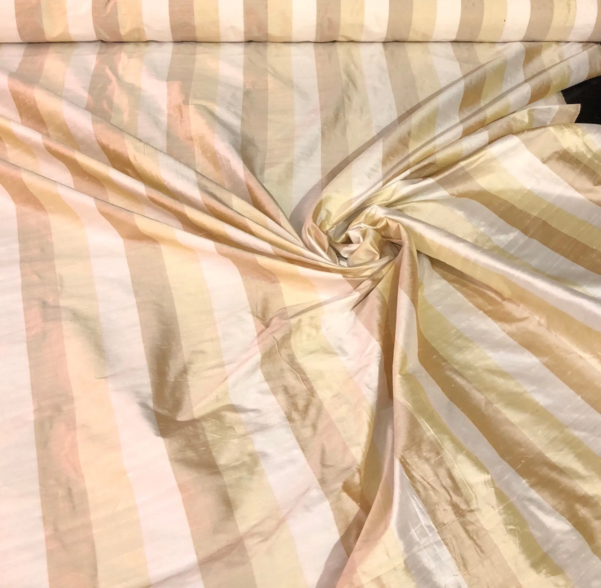 100% silk shantung stripe, 54&quot; wide. Beautiful ivory brownish yellow gold. Fabric sold by the yard.