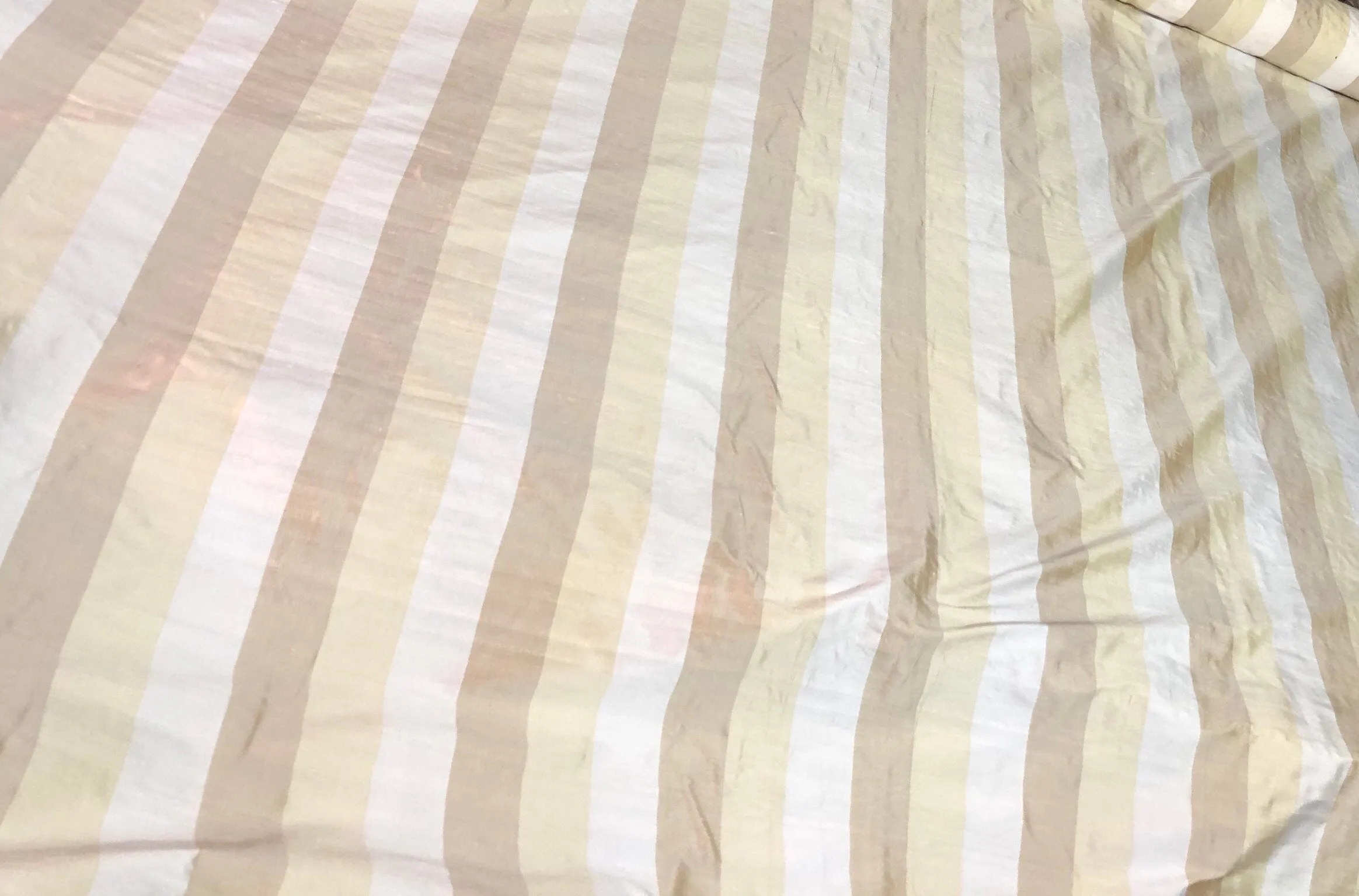 100% silk shantung stripe, 54&quot; wide. Beautiful ivory brownish yellow gold. Fabric sold by the yard.