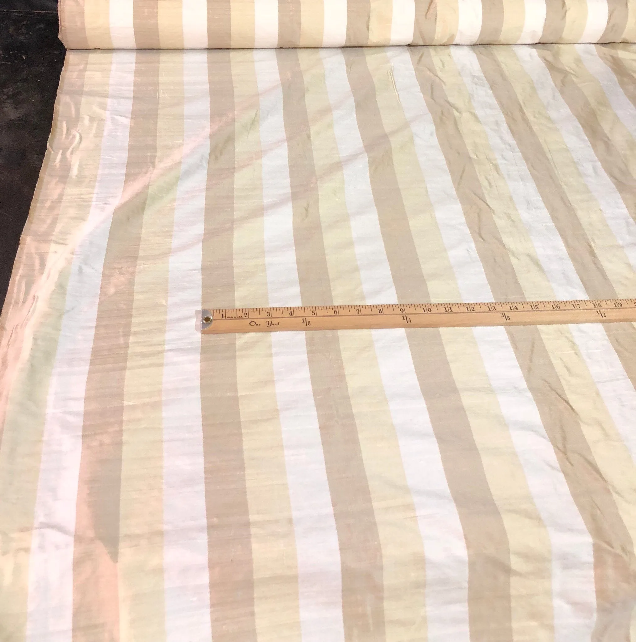 100% silk shantung stripe, 54&quot; wide. Beautiful ivory brownish yellow gold. Fabric sold by the yard.